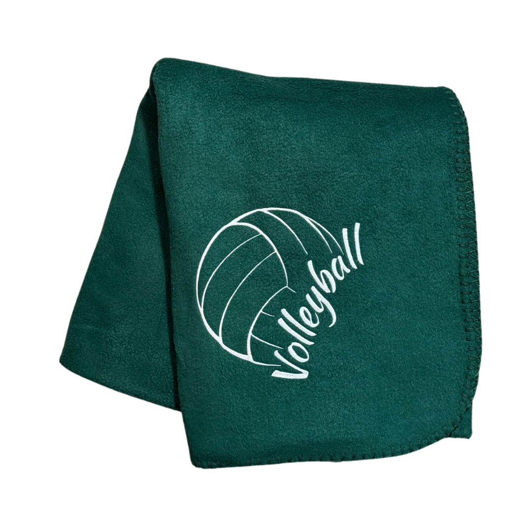 Green blanket with volleyball design and 'Volleyball' text in white stitching