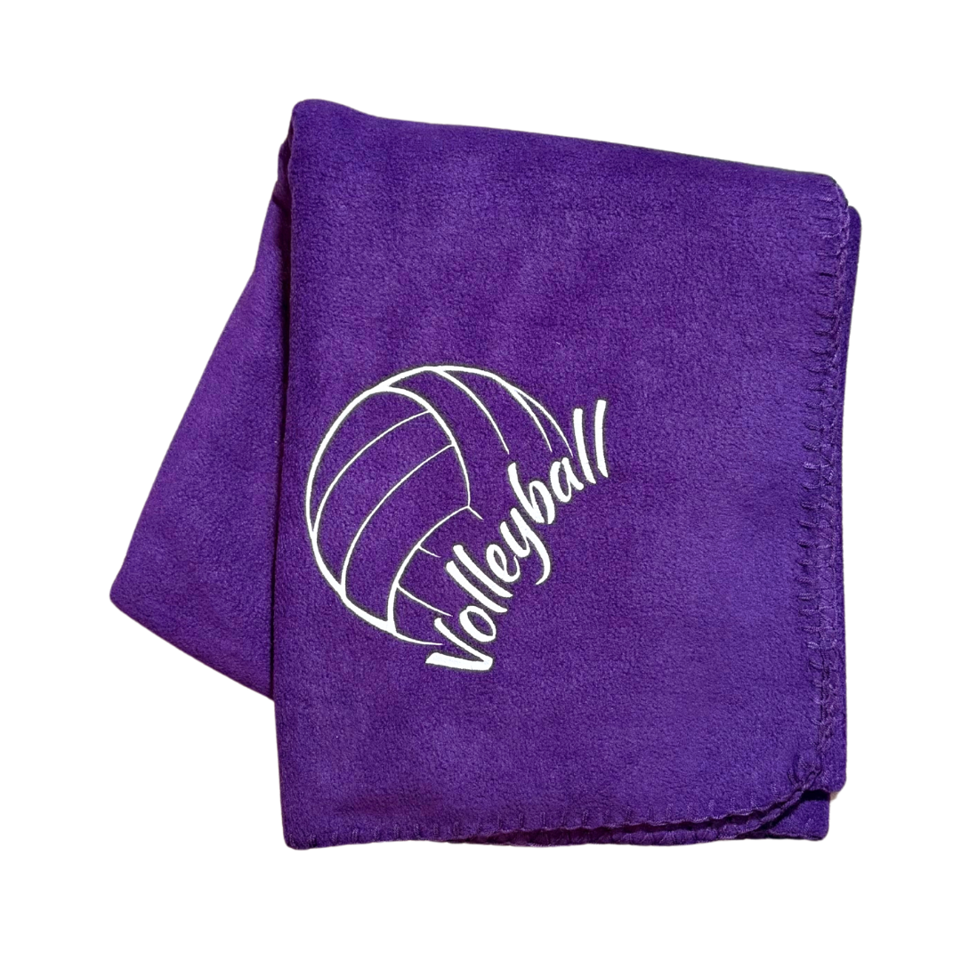 Purple fleece blanket with volleyball design and 'Volleyball' text in white