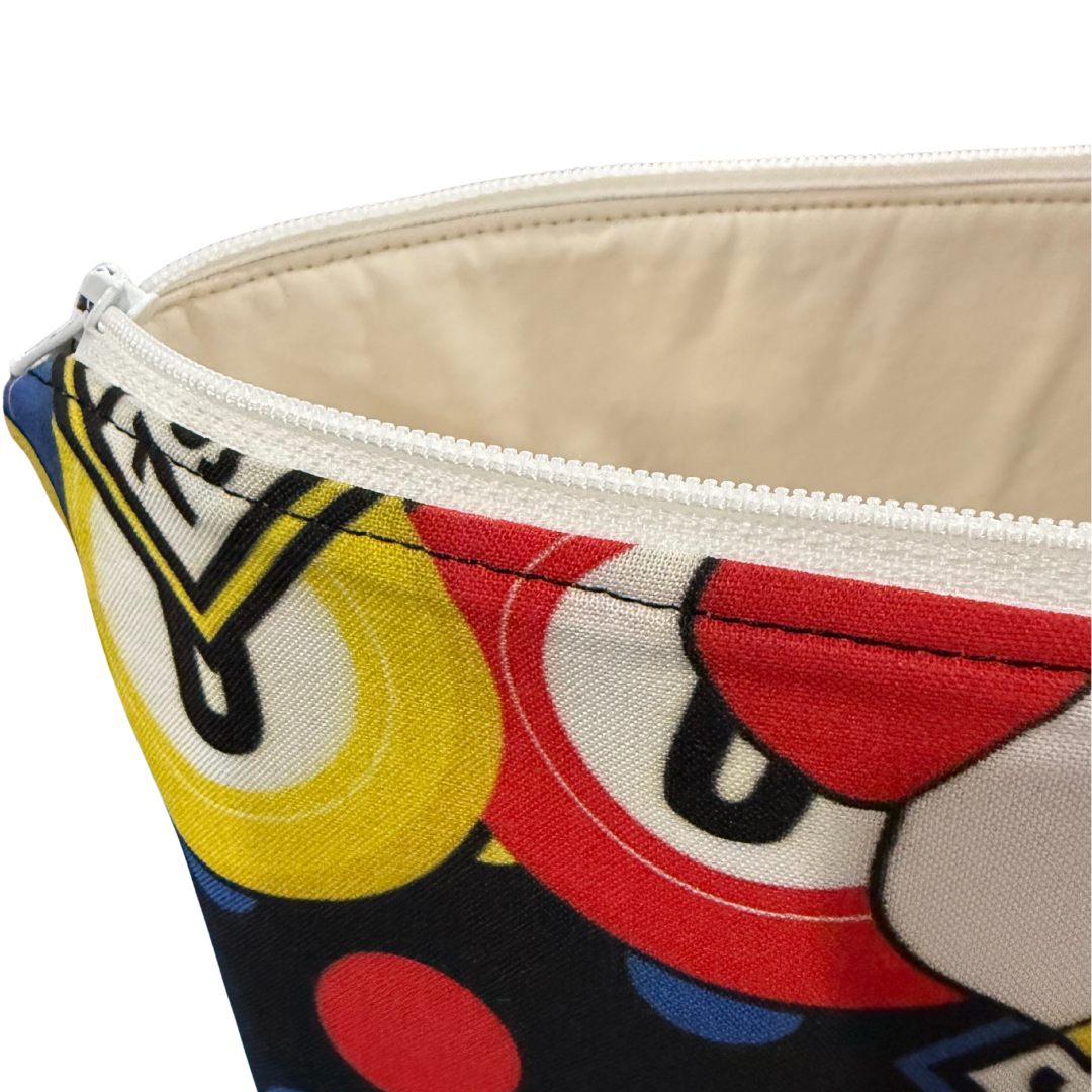 Close-up of a colorful pouch with bingo design with vinyl lining