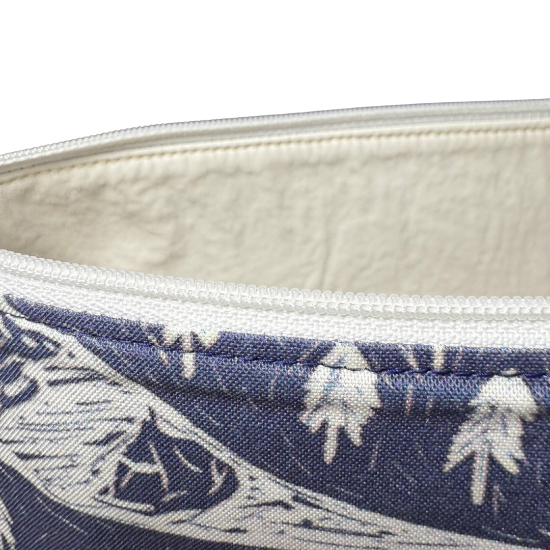 white vinyl lining inside hiking themed makeup bag