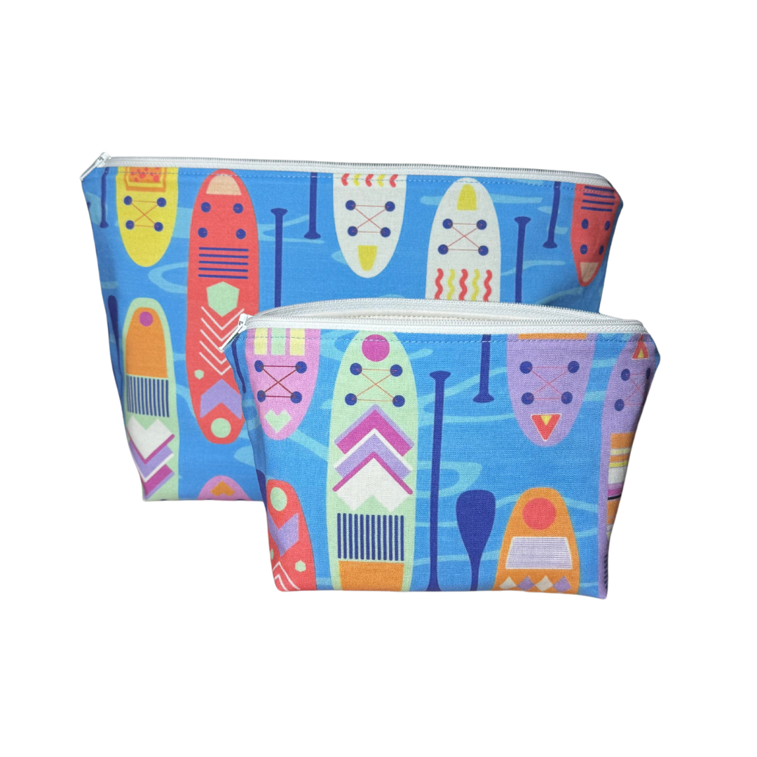 blue paddleboard themed makeup bag set