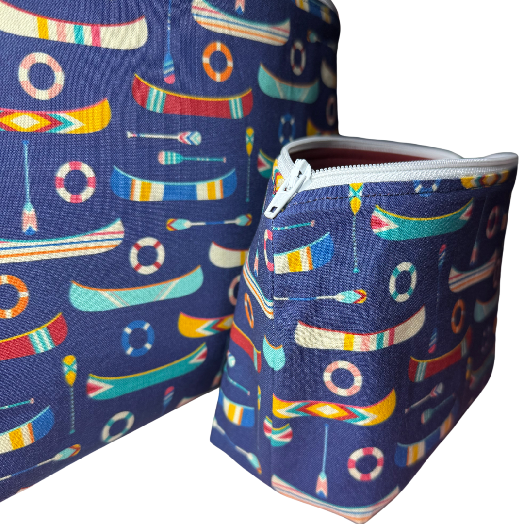 side of canoe makeup bag with squared bottom