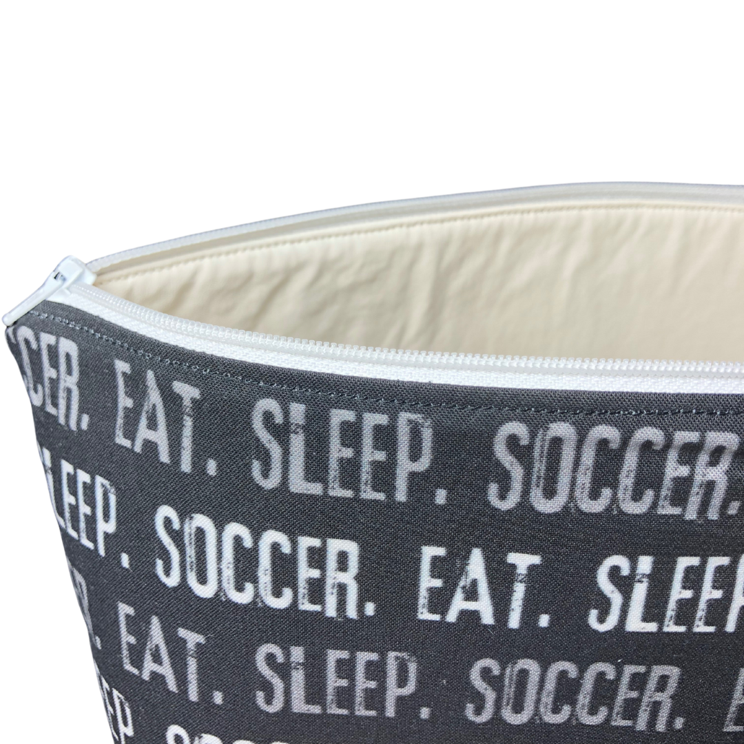 eat sleep soccer makeup bag closeup view