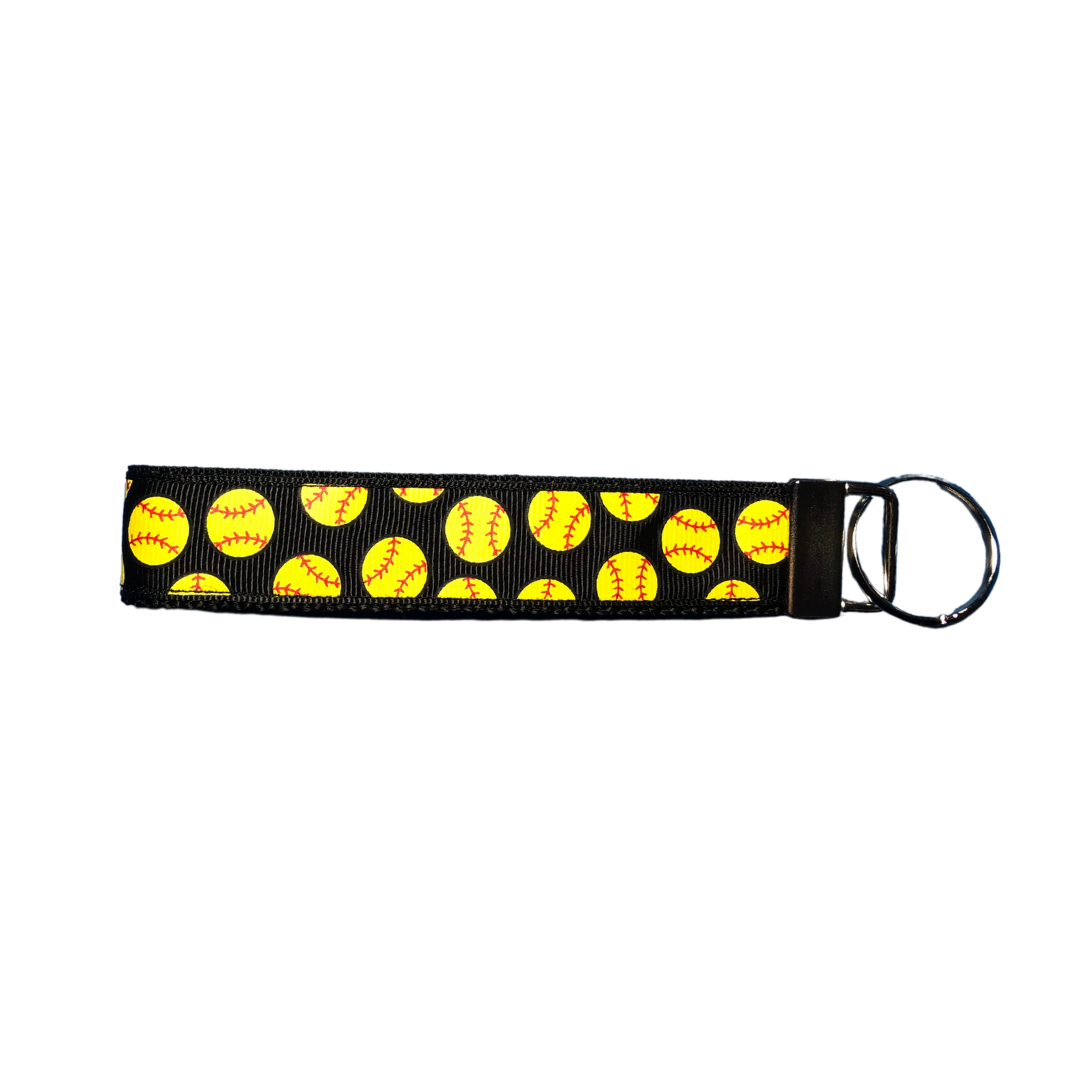 black softball keychain wristlet with yellow softballs