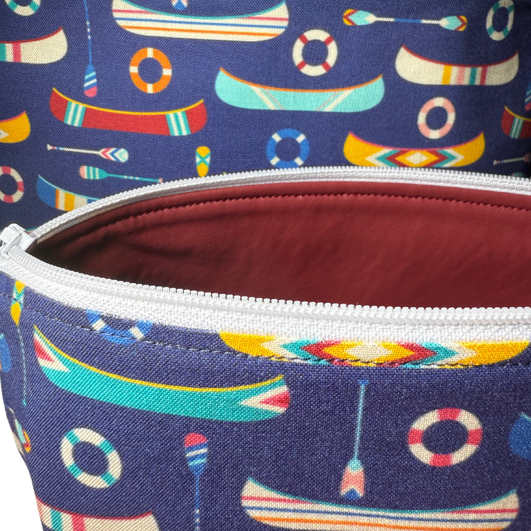 red vinyl lining in canoe makeup bag