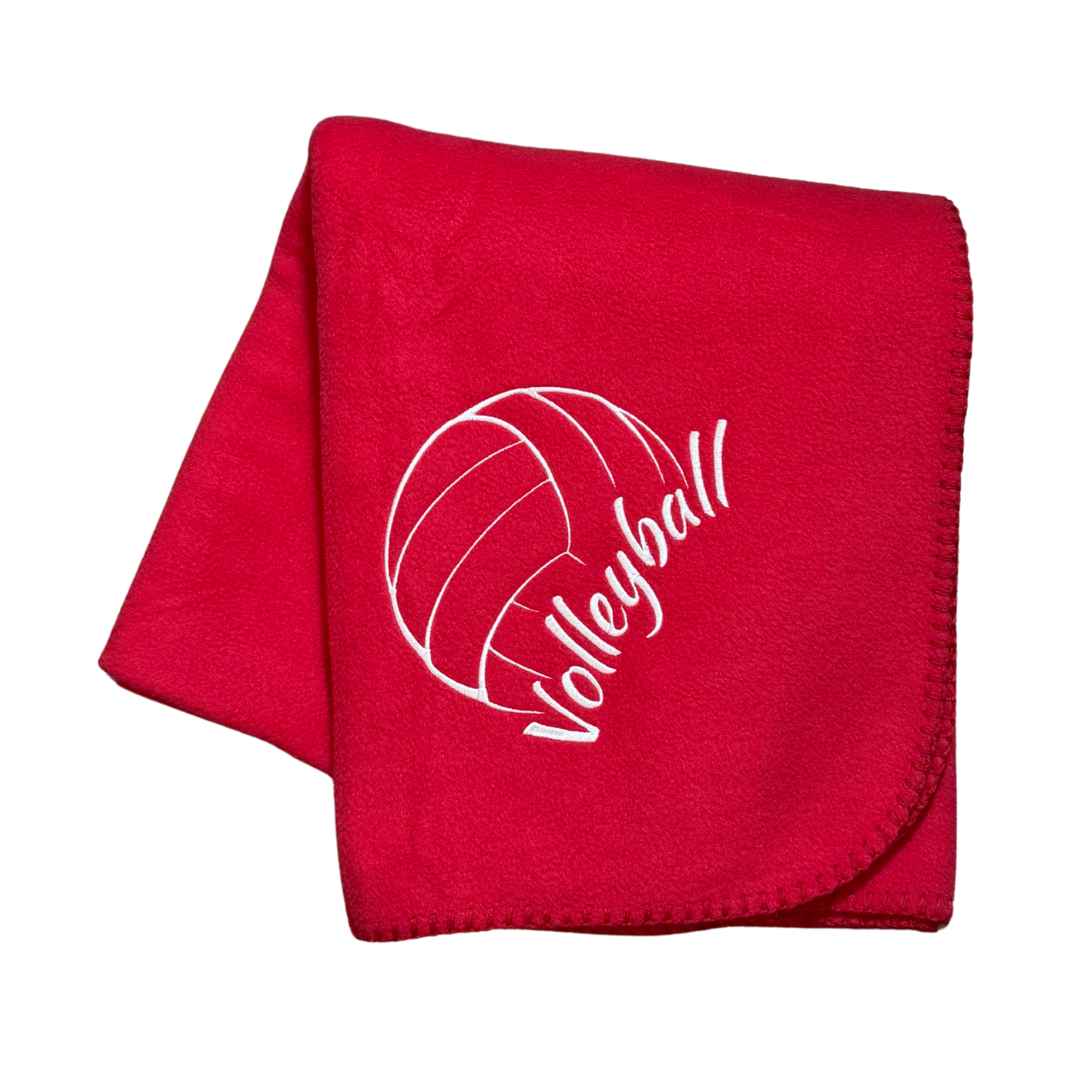 Red blanket with white volleyball design and white text