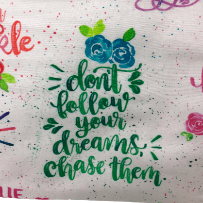girl power makeup bag with "don't follow your dreams, chase them" in script font