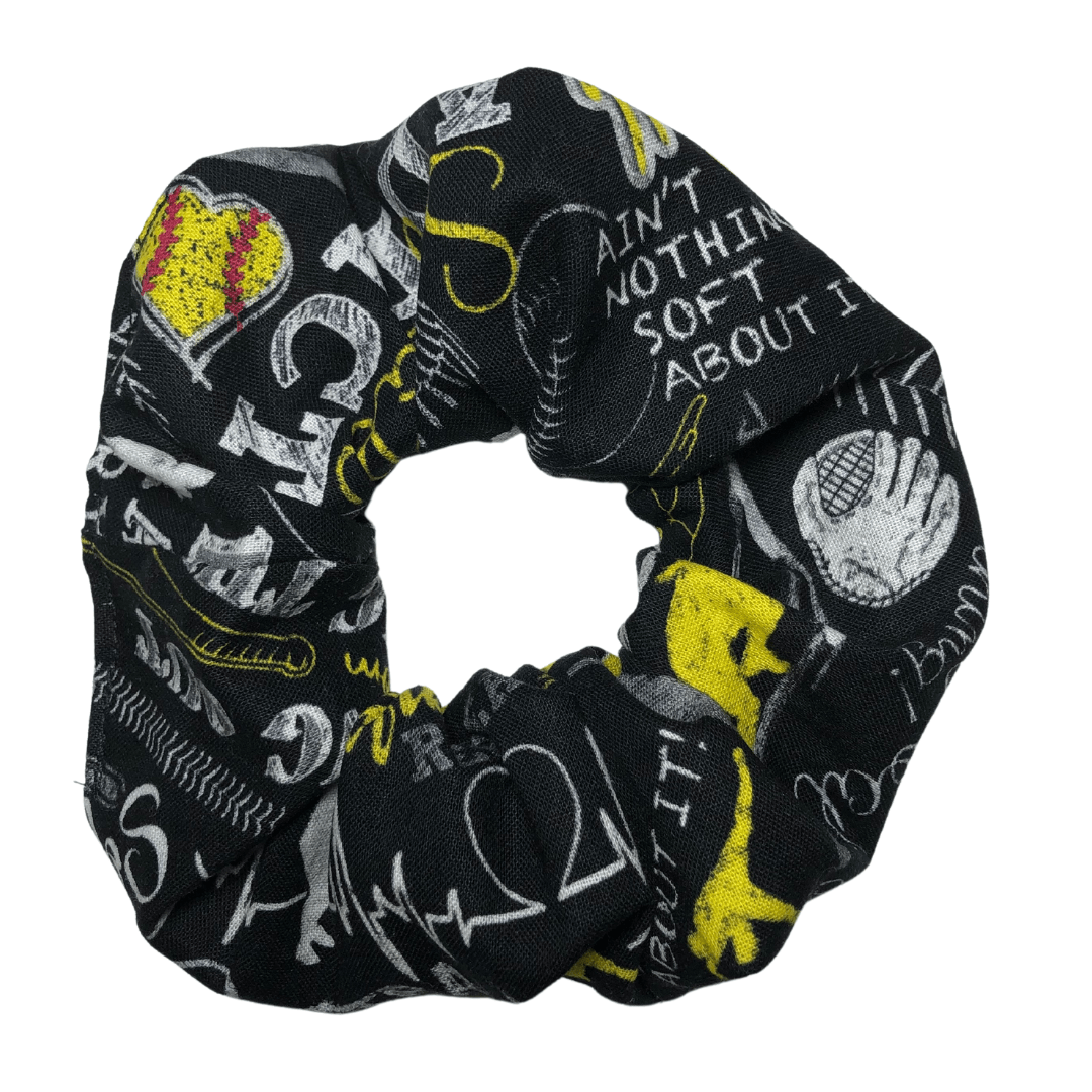 black softball scrunchie with softball words and pictures in white and yellow