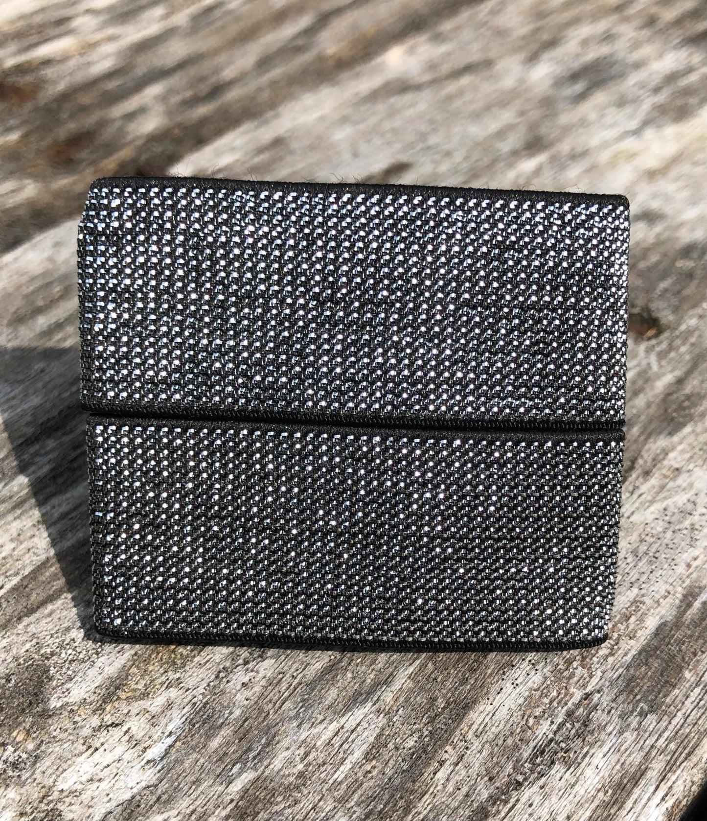 metallic silver and black sleeve clips