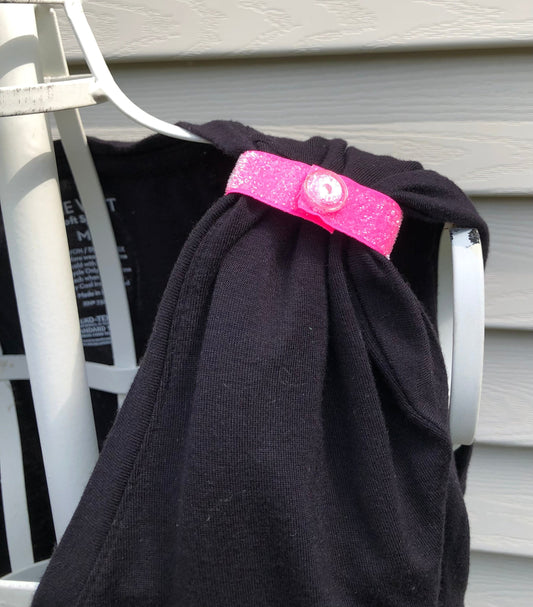 pink sleeve clip on black tshirt