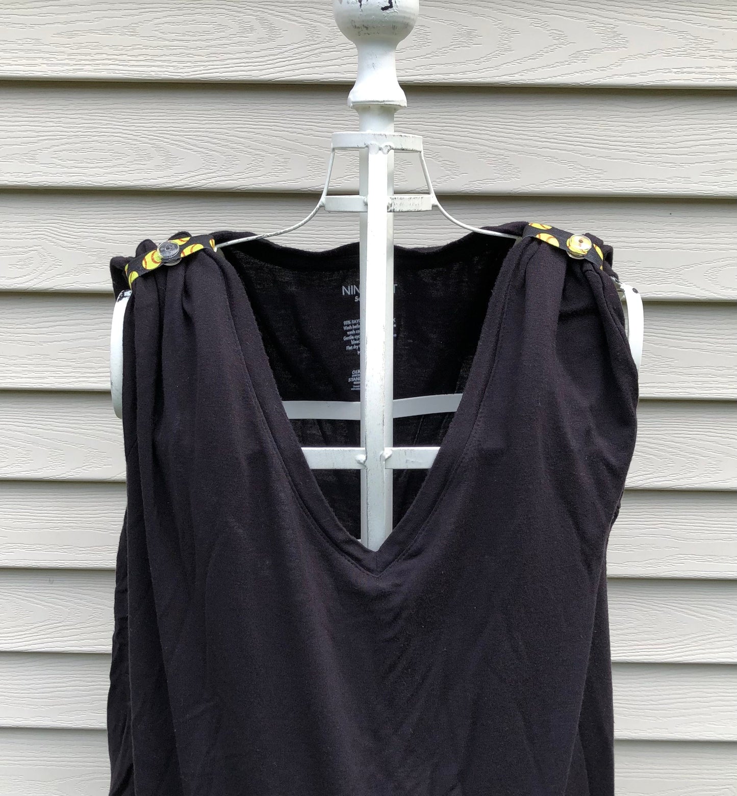 black tshirt with black softball sleeve clips