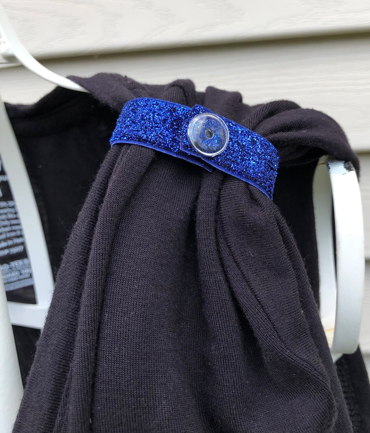 navy blue glitter sleeve clip on black tshirt