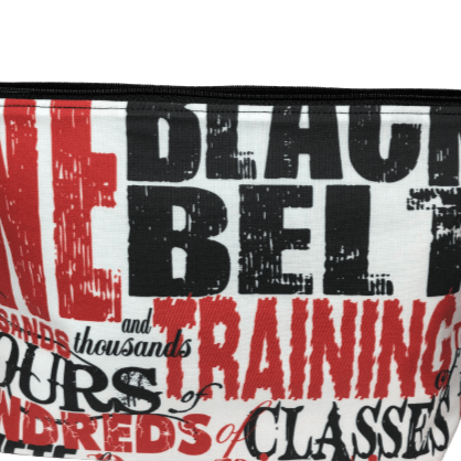 black belt fabric makeup bag with words like training, classes, black belt in black and red with white background