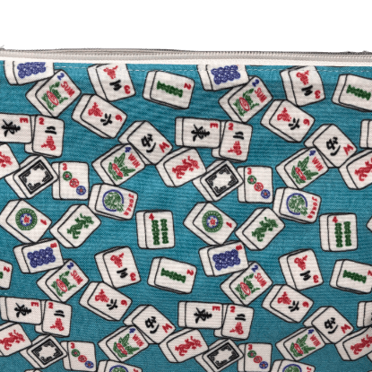 teal blue bag with mahjong tiles