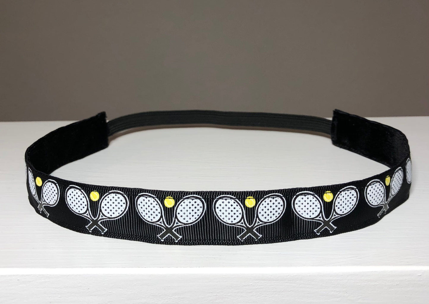 black tennis headband on tabletop