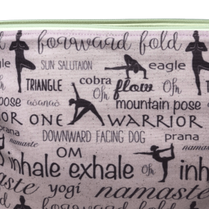 yoga zippered bag with yoga terms such as exhale, namaste, and forward fold with silhouettes of a woman doing yoga poses