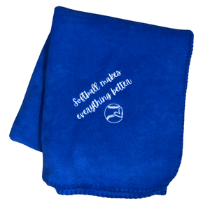 royal blue softball blanket that says softball makes everything bettter with a heart in a softball