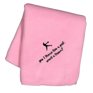pink softball girl blanket with "yes I throw like a girl...want a lesson?" embroidered in black