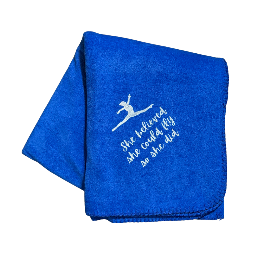 Blue fleece blanket with white text and graphic