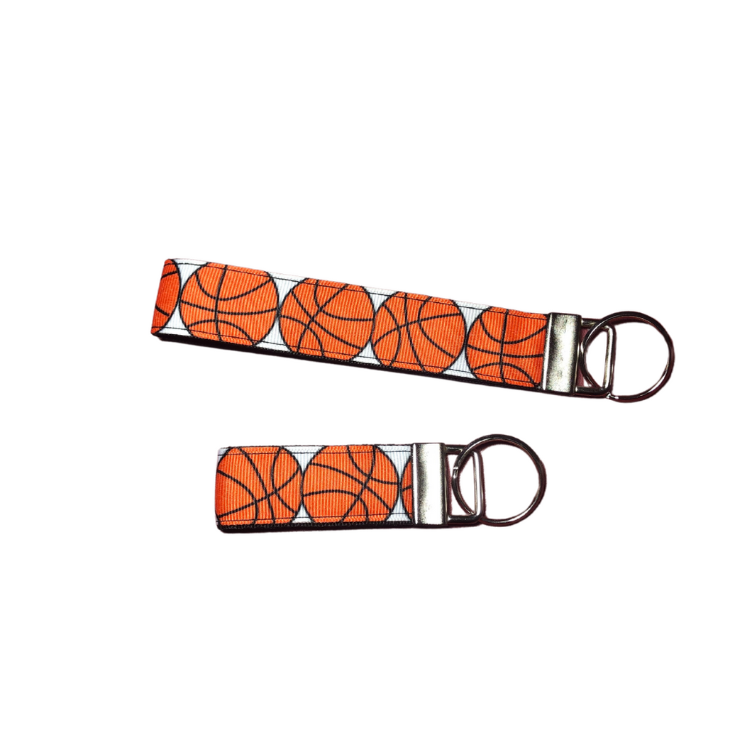 set of basketball keychains - one wristlet and one mini