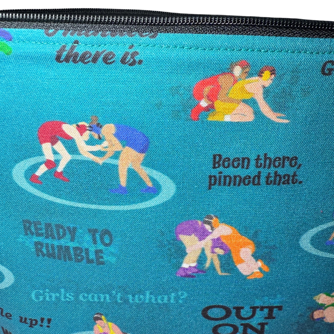 close up view of teal wrestling fabric