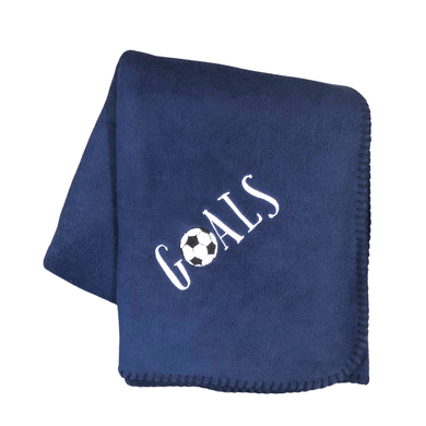 navy blue soccer blanket with GOALS embroidered with soccer ball as the O in Goals