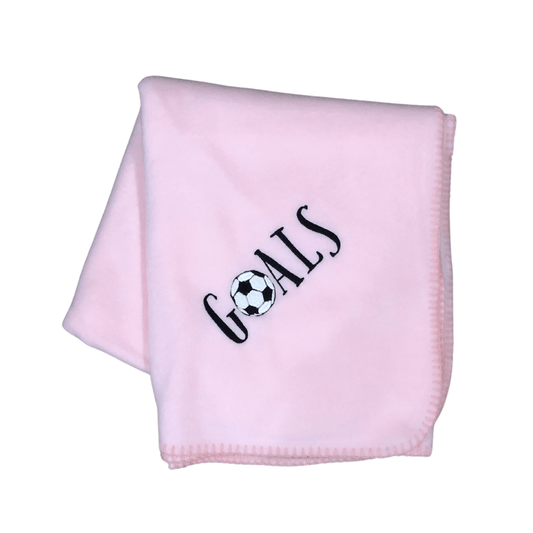 pink Goals blanket with soccer ball as the O in Goals
