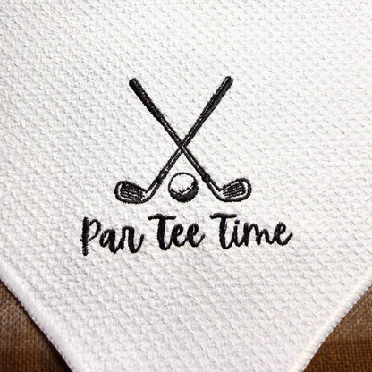 Embroidered design of crossed golf clubs with a golf ball and 'Pan Tee Time' text on white microfiber towel