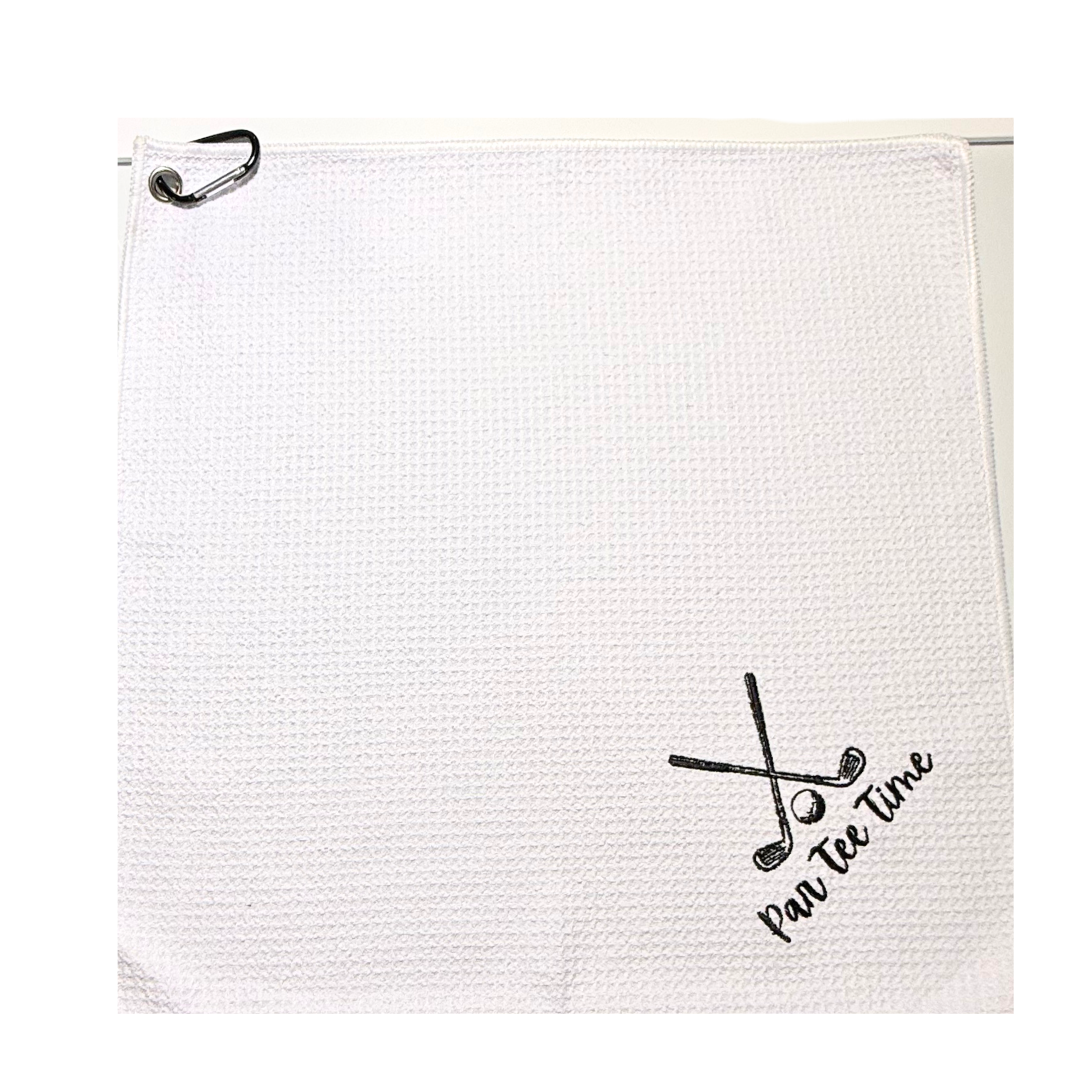 White golf towel with 'Par Tee Time' text and golf club icons on a white background