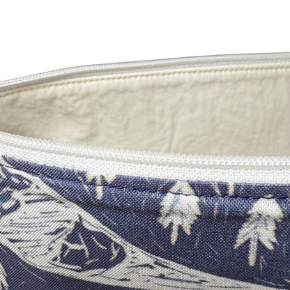 white vinyl lining inside hiking themed makeup bag