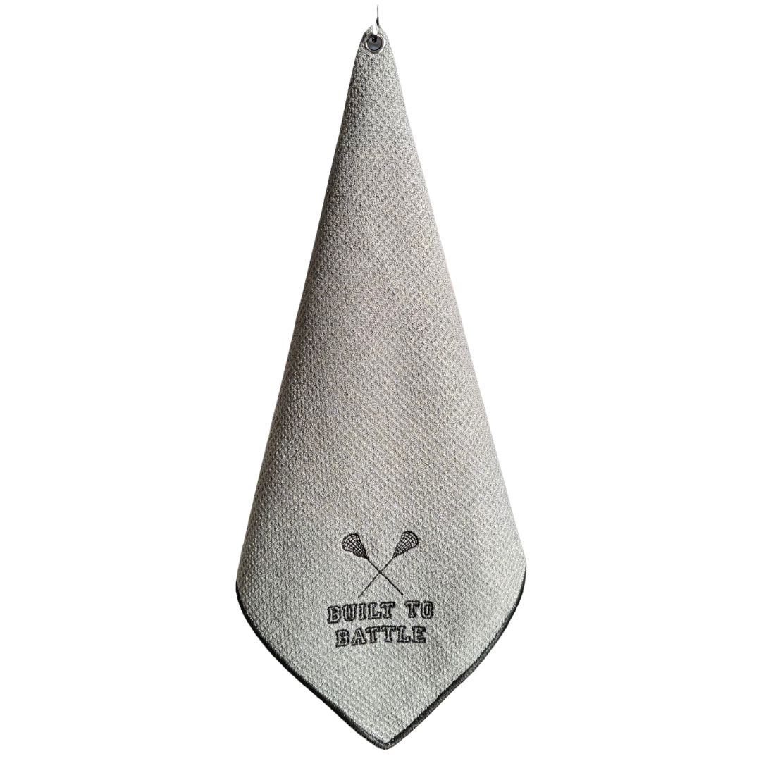 Gray towel with 'Built to Battle' text and graphics on a white background