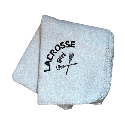 light gray lacrosse fleece blanket with black embroidery