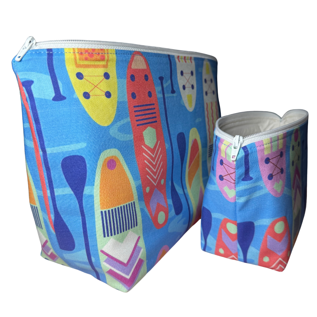 side view of paddleboard makeup bags with boxed out bottom