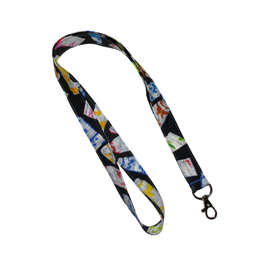 paint lanyard with tubes of colorful paint