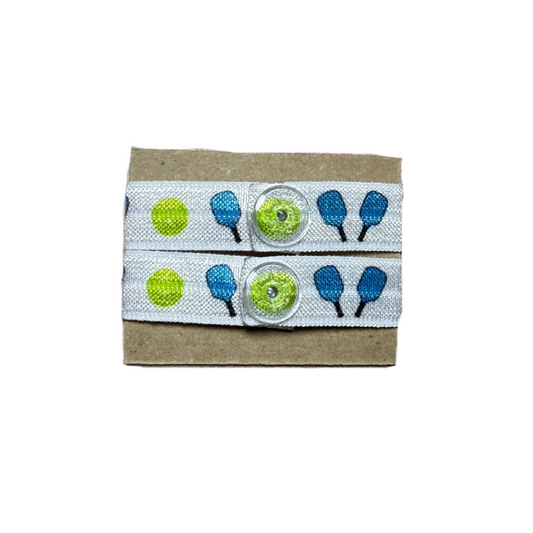 set of two pickleball sleeve clips with blue paddles and yellow balls