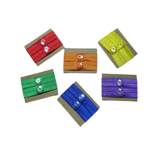 red orange yellow green blue and purple sleeve clips