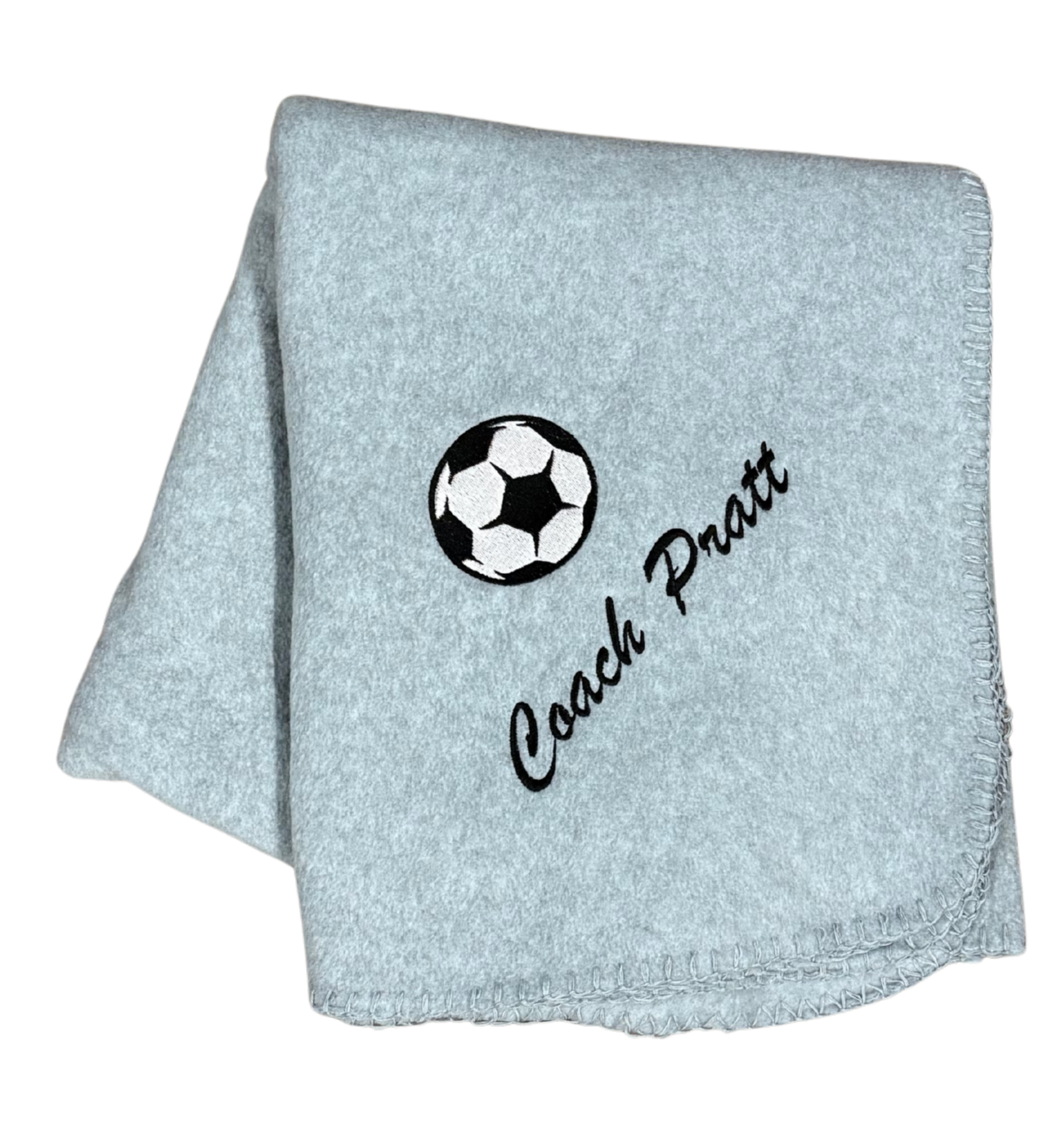 Gray personalized soccer blanket with soccer ball in black and white and name embroidered in black