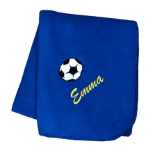 Load image into Gallery viewer, personalized soccer blanket with a black and white soccer ball and name Emma underneath the ball
