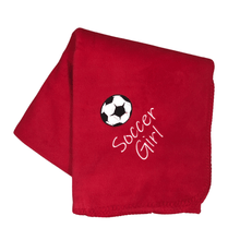 Load image into Gallery viewer, red soccer blanket with black and white soccer ball and soccer girl stitched underneath the ball
