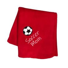 Load image into Gallery viewer, red soccer mom blanket with black and white soccer ball
