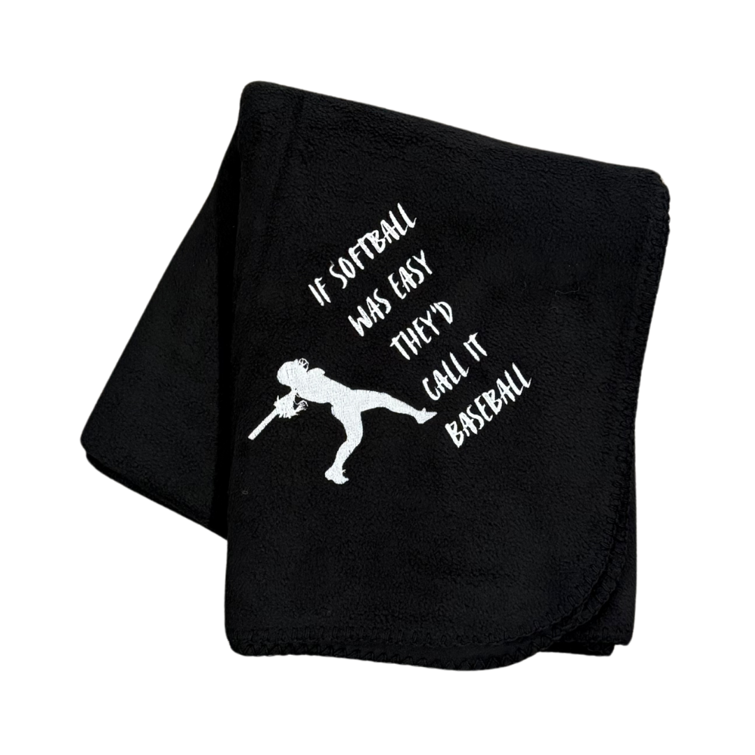 Black fleece blanket with white softball graphic and text