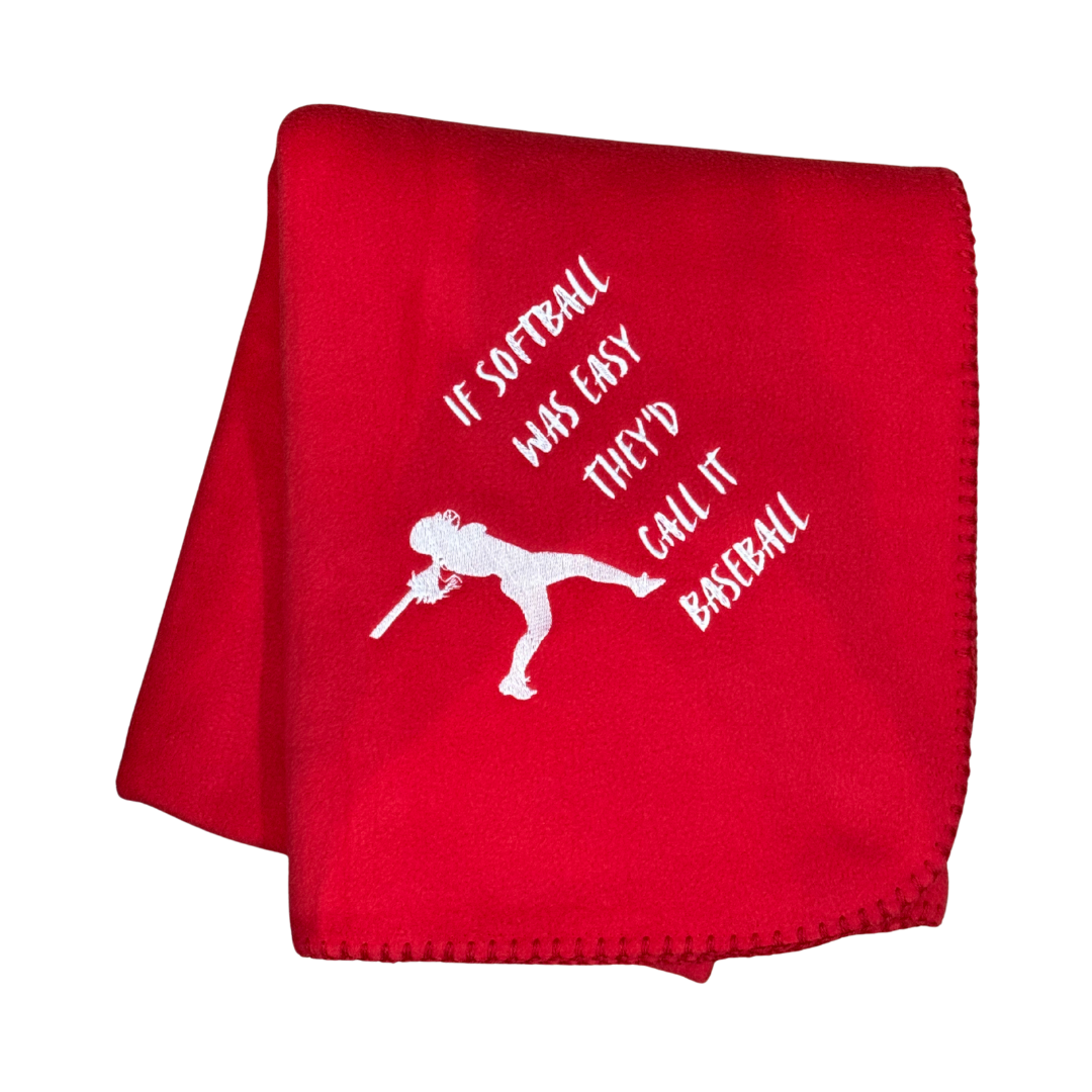 Red blanket with white text and softball player graphic