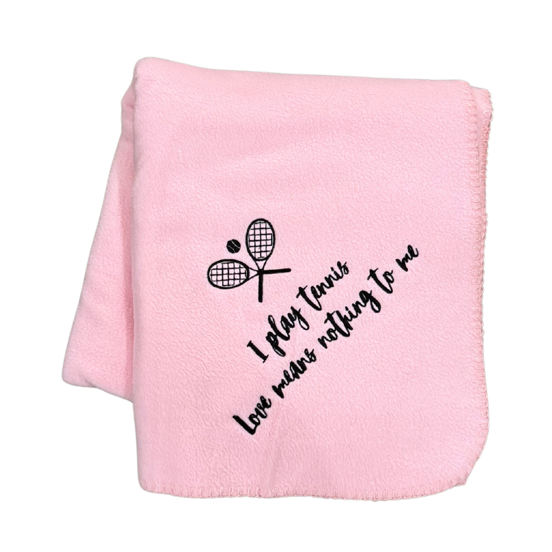 pink tennis blanket with I play tennis loves means nothing to me and tennis rackets in black embroidery thread