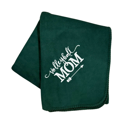Green fleece blanket with 'Volleyball Mom' text in a white embroidery