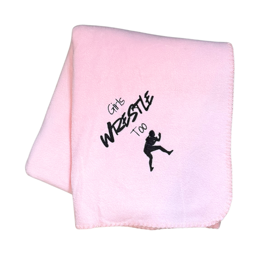 Pink blanket with 'Girl Wrestle Too' text and silhouette in black embroidery
