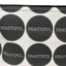 Load image into Gallery viewer, close up image of makeup bag with the word beautiful in the center of large black circles on white background
