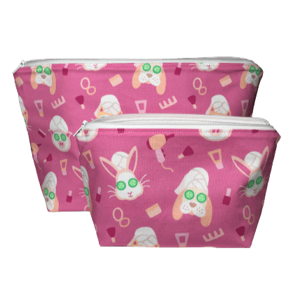 pink spa makeup bag set with cartoon bunnies and dog with cucumbers on eyes