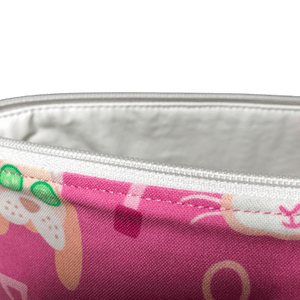 white lining and zipper on pink spa makeup bag