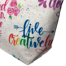 Load image into Gallery viewer, girl power cosmetic bag with &quot;live creatively&quot; phrase in rainbow script
