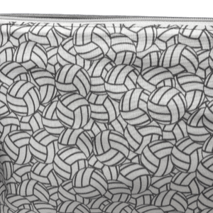 fabric with white and gray volleyballs in overlapping pattern